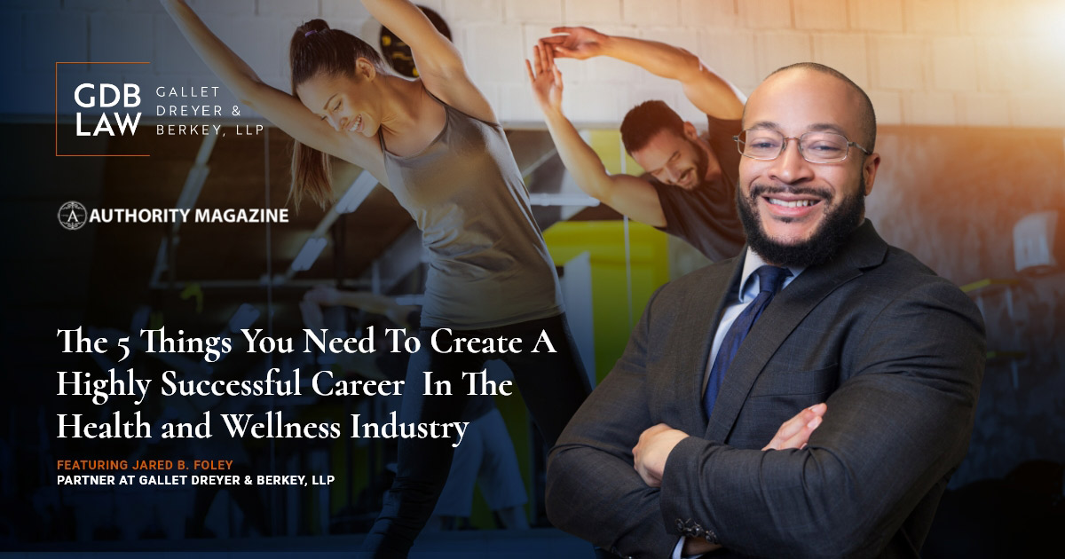 Jared Foley in front of a picture of health and fitness people