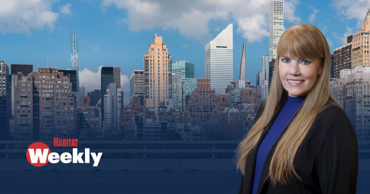 Michelle P. Quinn in the foreground of an image of a city skyline with the publication name Habitat Weekly in the bottom left corner 