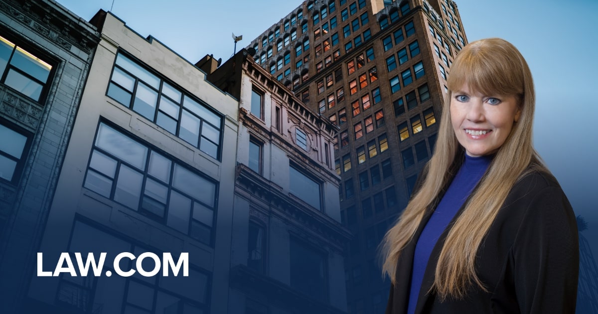 Michelle P. Quinn in the foreground of condominiums with the Law.com logo in the bottom left corner.