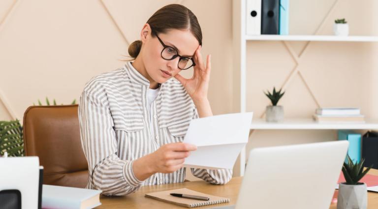 businesswoman reading a letter