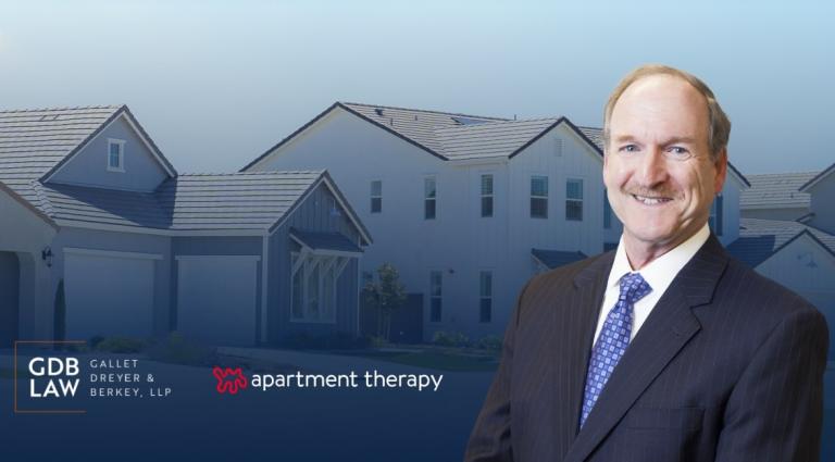David Berkey in the foreground of houses with the GDB and Apartment Therapy logos in the bottom left corner 