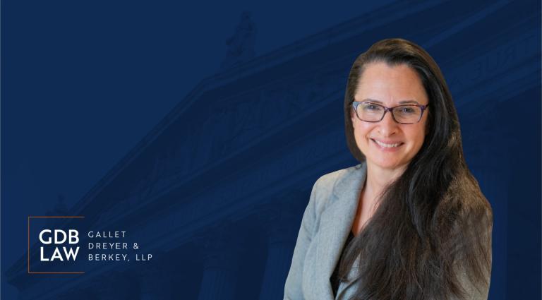 Headshot of Beth M. Gazes on a blue background with the GDB logo in the bottom left foreground.