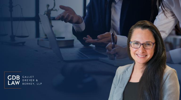 Headshot of Beth M. Gazes in the foreground of a blue-toned background featuring a laptop, legal scales, and two people reviewing documents, alongside the GDB Law (Gallet Dreyer & Berkey, LLP) logo.