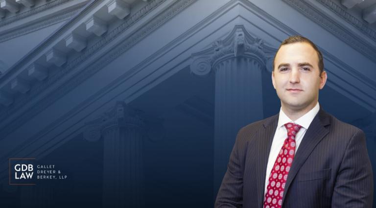 Headshot of Adam J. Berkey in the foreground of a blue-toned background featuring courthouse columns, with the GDB Law (Gallet Dreyer & Berkey, LLP) logo displayed on the left.