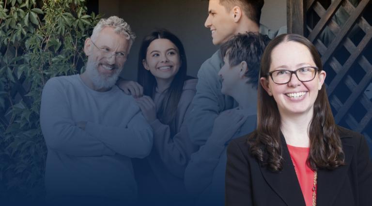 Sarah R. Gersowitz wearing glasses, a black blazer, and a coral blouse, smiling at the camera. Behind her is a softly blurred image of a multigenerational family gathered together outdoors, including an older man and two younger family members. The image conveys themes of family relationships, sibling rights, and family law.